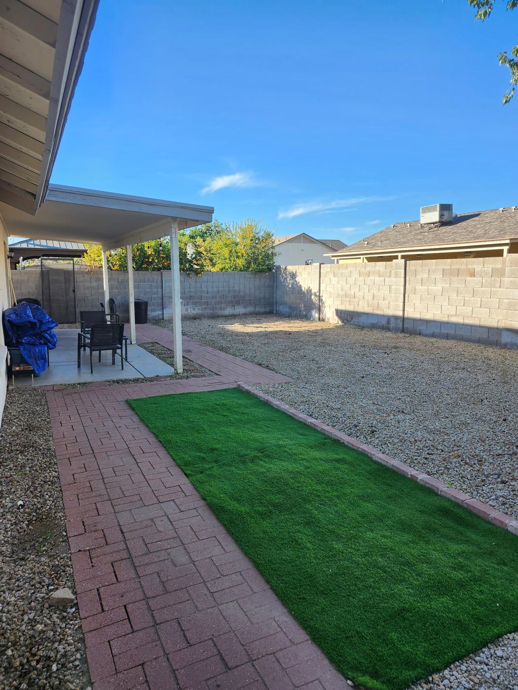Backyard Turf and Rock Cleanup after service